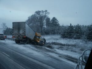 Jackknife Truck Accident on the road in snow weather