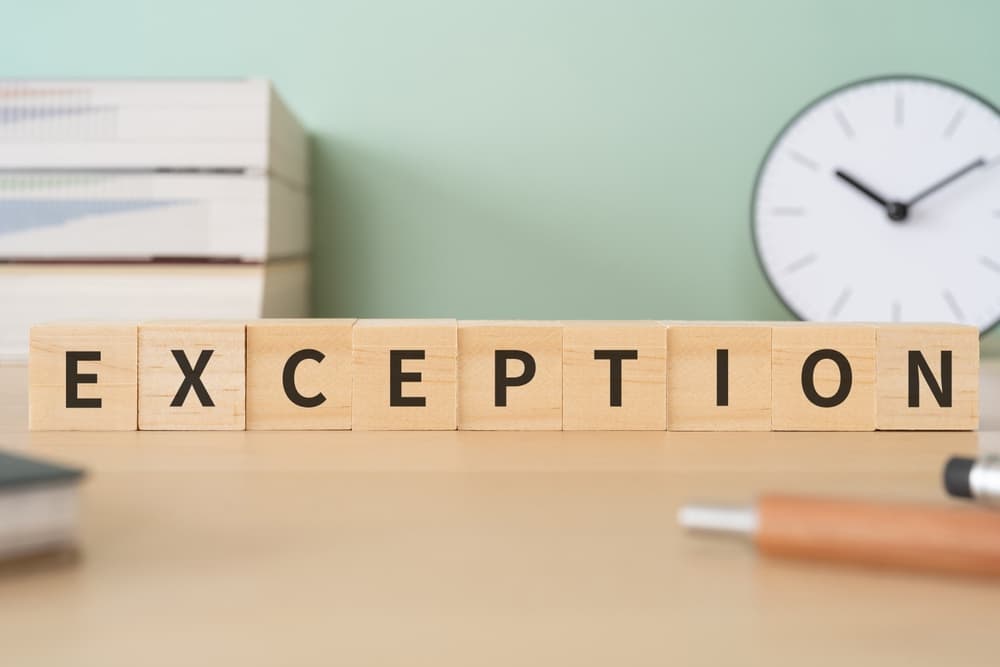 Exception written on wooden blocks