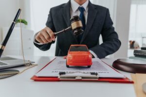 Car Accident Attorney in chamber holding judge's gavel 