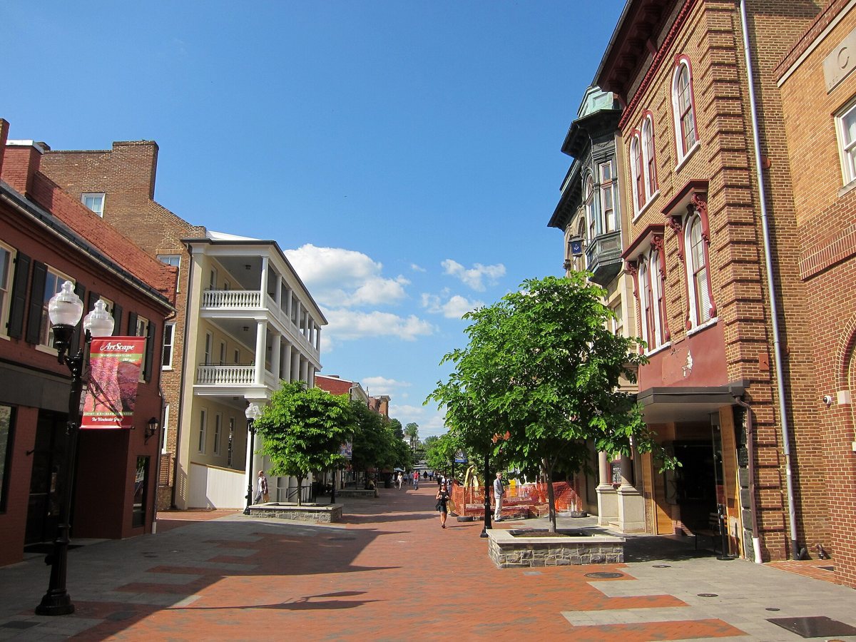 The brick-paved Loudoun Street pedestrian mall in Old Town Winchester on a sunny day